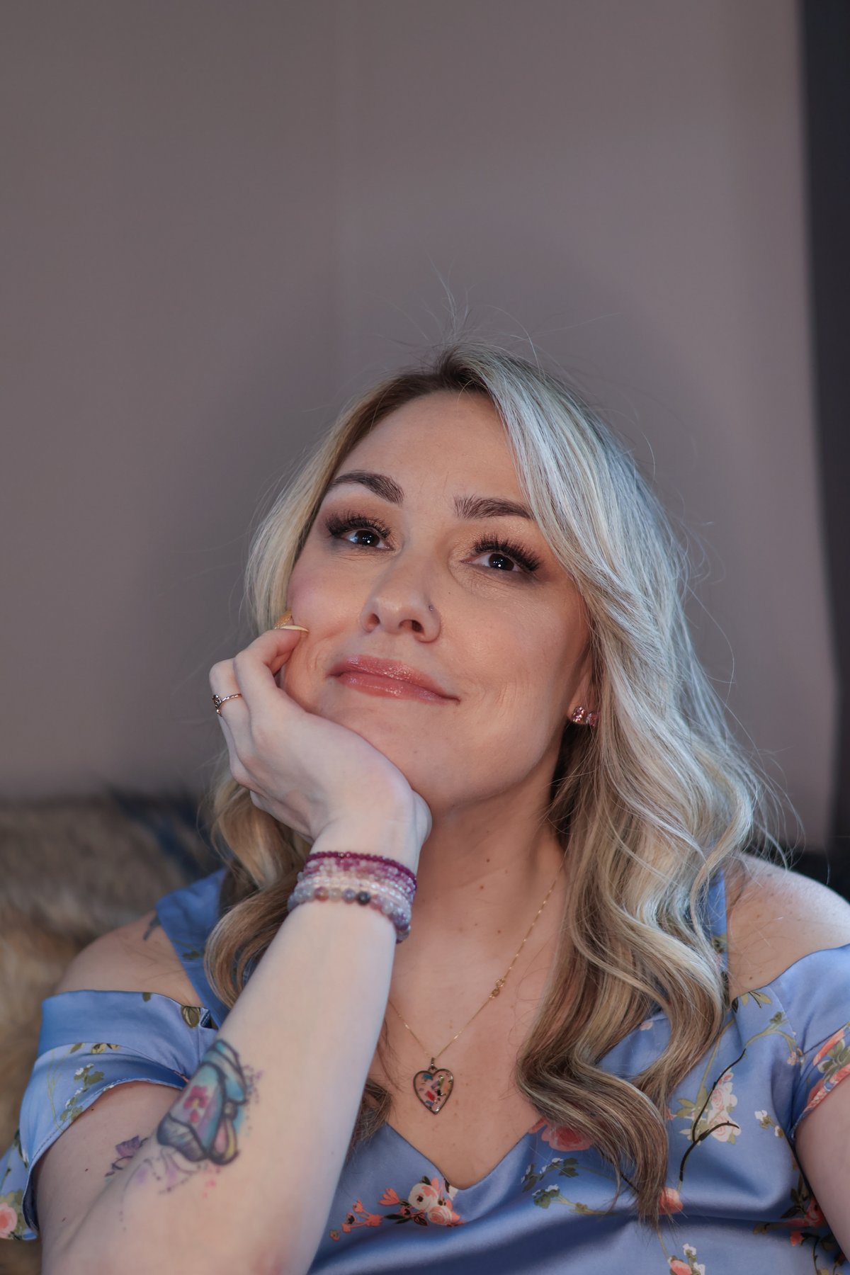 Loren Galese in a blue floral blouse